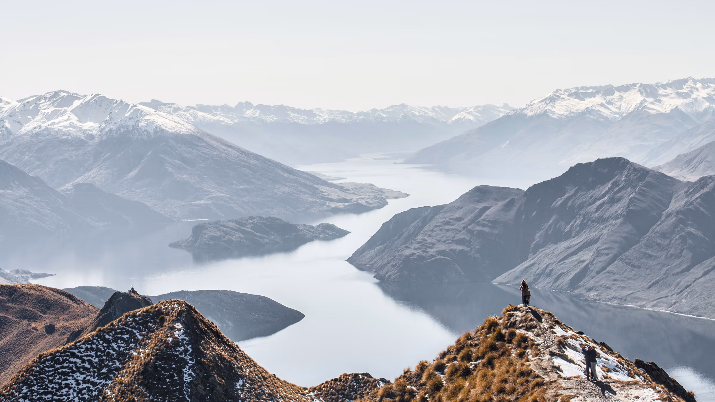 Snowy mountain lake view from Roys Peak